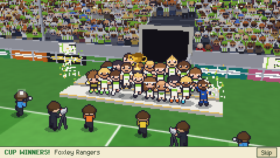 The team lifts the cup on a podium